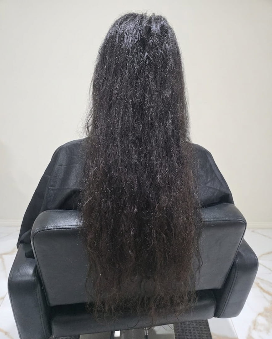 Dull strands with minimal curl pattern.