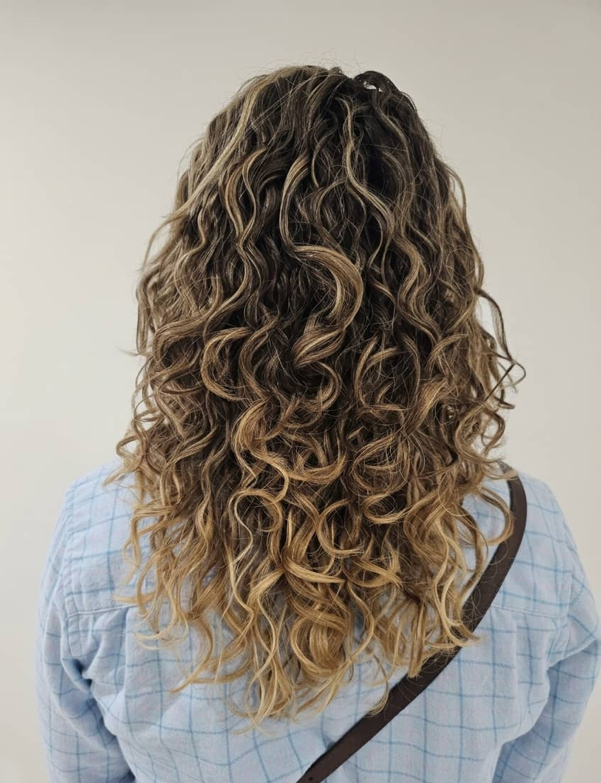 Soft, luminous curls with balanced moisture and tone.