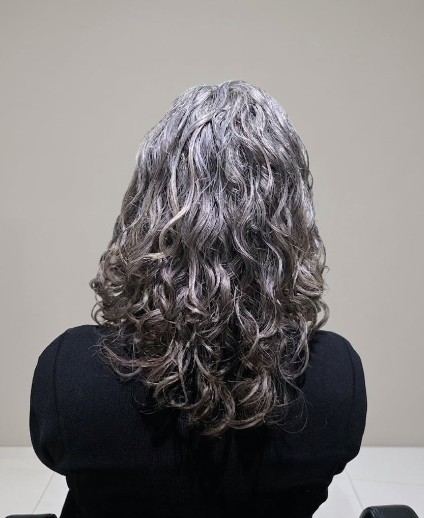 Hydrated, radiant curls embracing natural texture and shine.