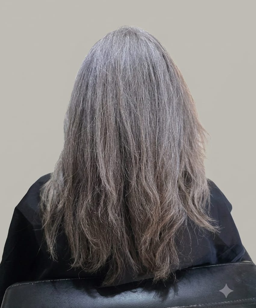 Coarse strands with silver tones needing care.