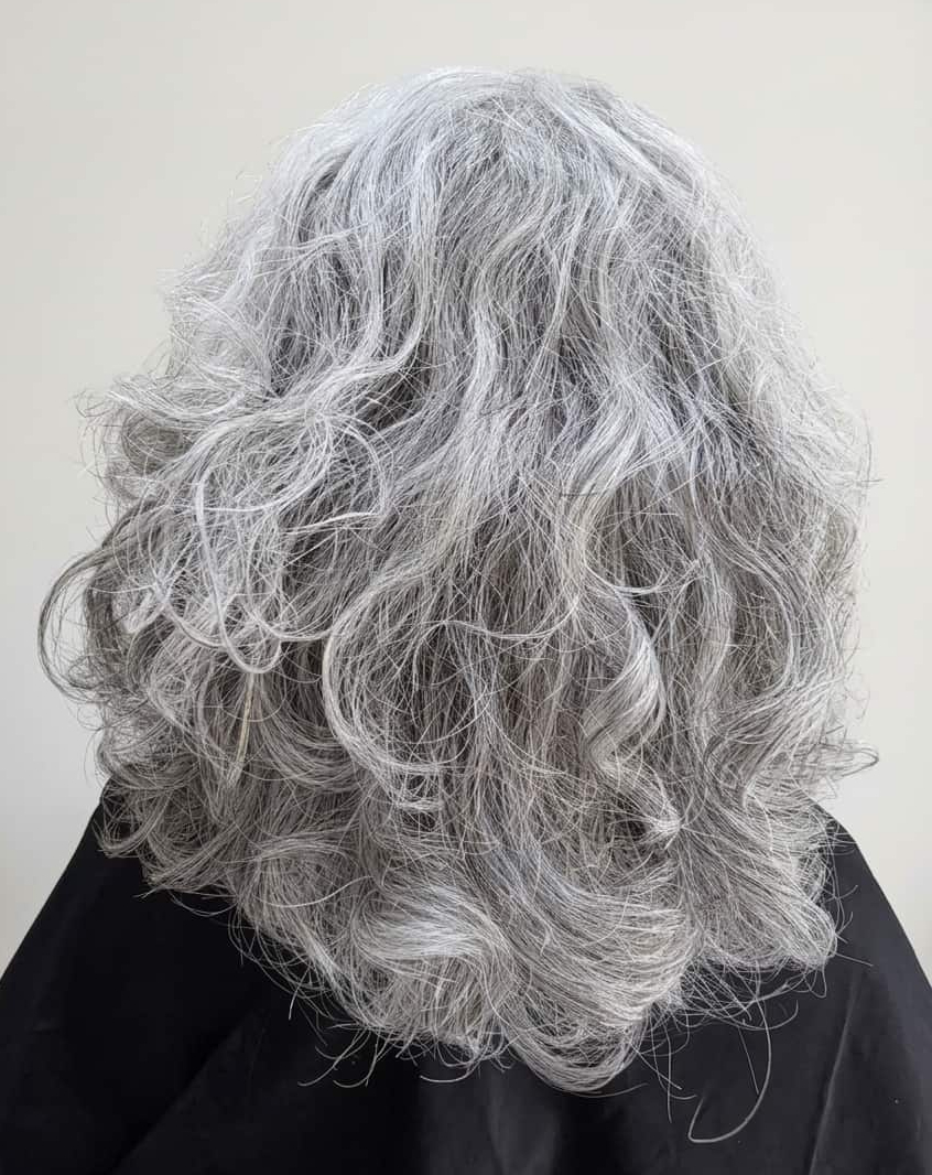 Natural silver texture with soft, relaxed waves.