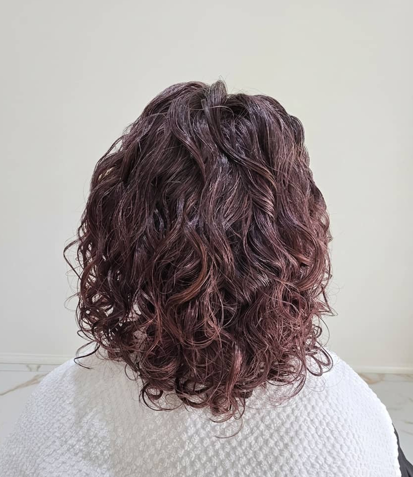 Revived curls glowing with tone, hydration, and movement.