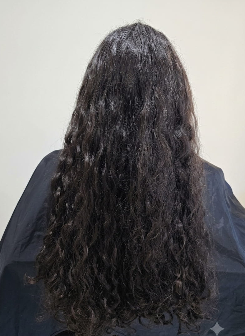 Tight curls needing structure and hydration.