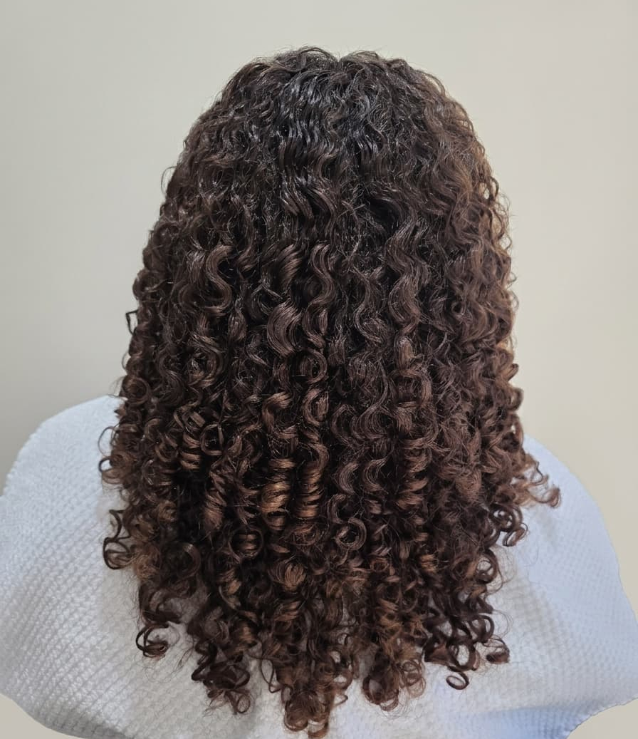 Hydrated curls restored with bounce and definition.