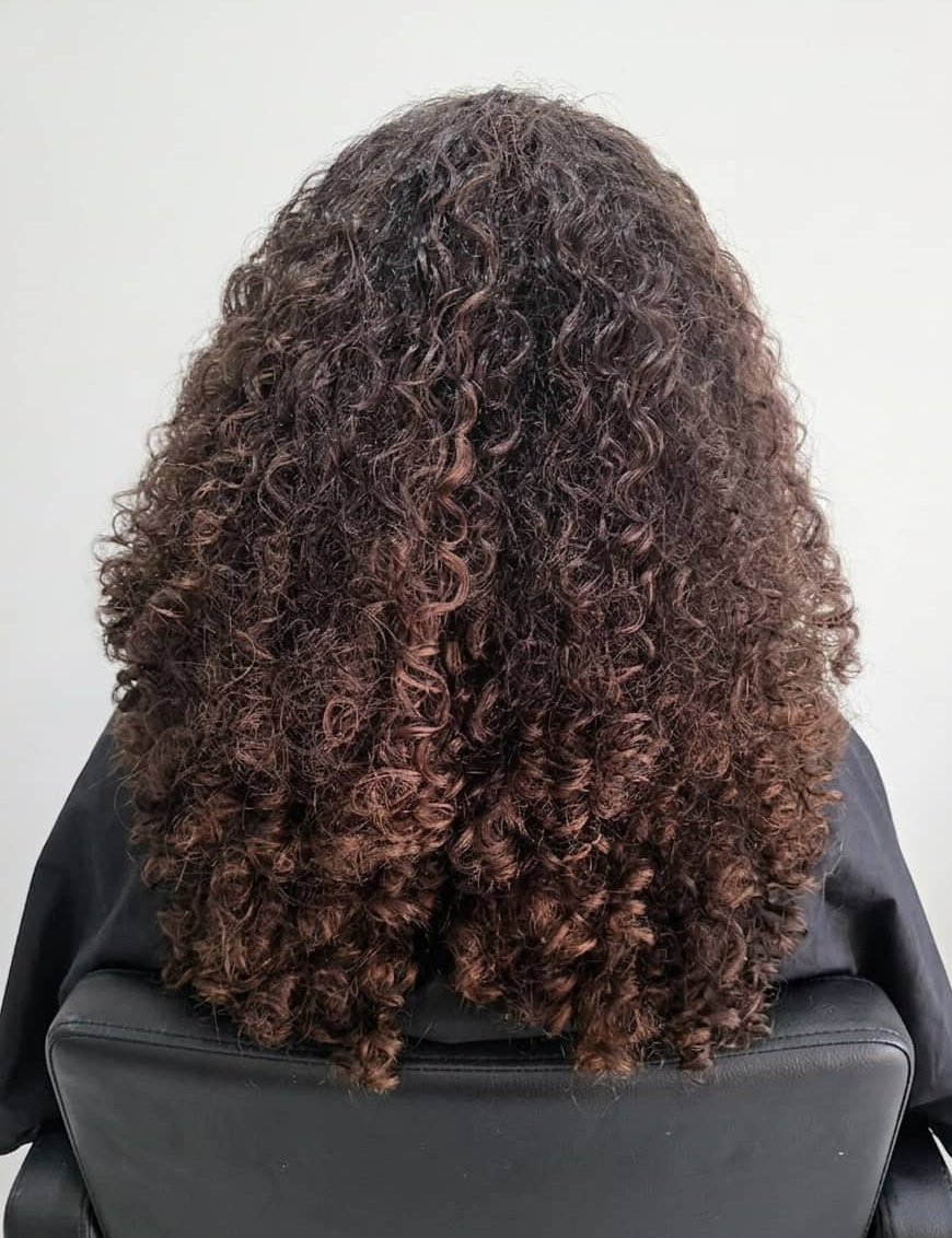 Frizz and dryness hiding natural texture.