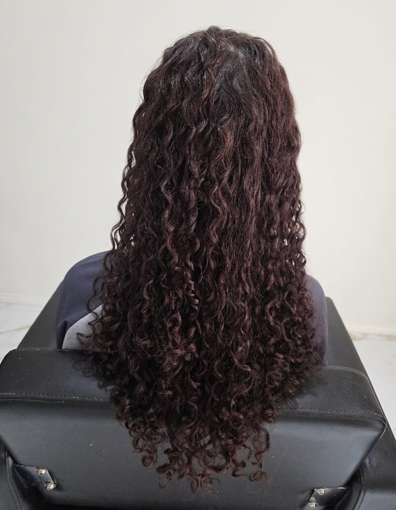 Hydrated curls restored with bounce and definition.