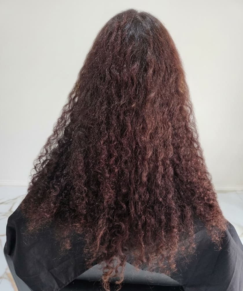 Frizz and dryness hiding natural texture.