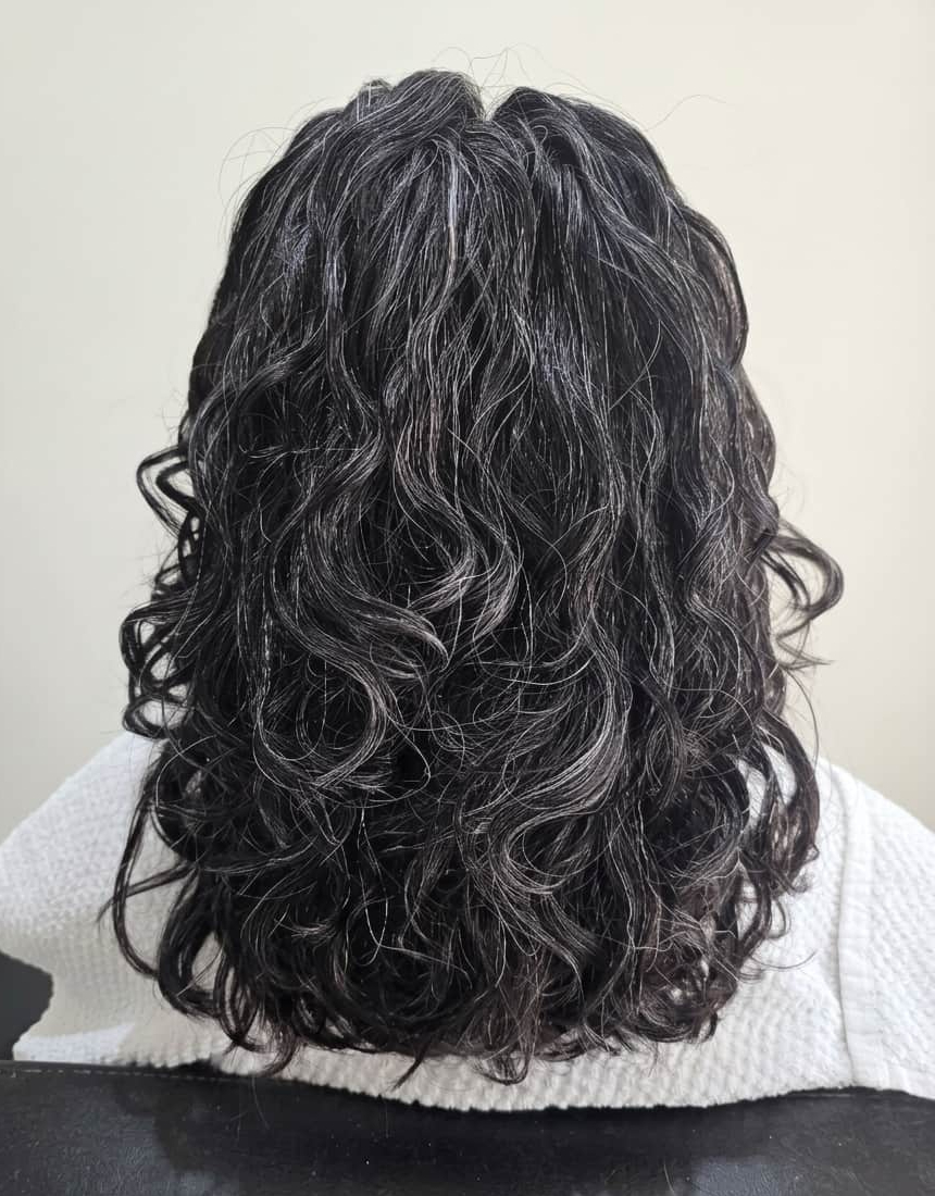 Hydrated curls restored with bounce and definition.
